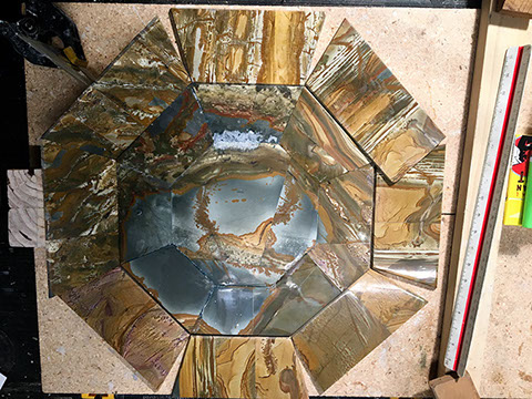 Layout of stone used in constructing a water fountain art basin by Santa Fe Stone Creations